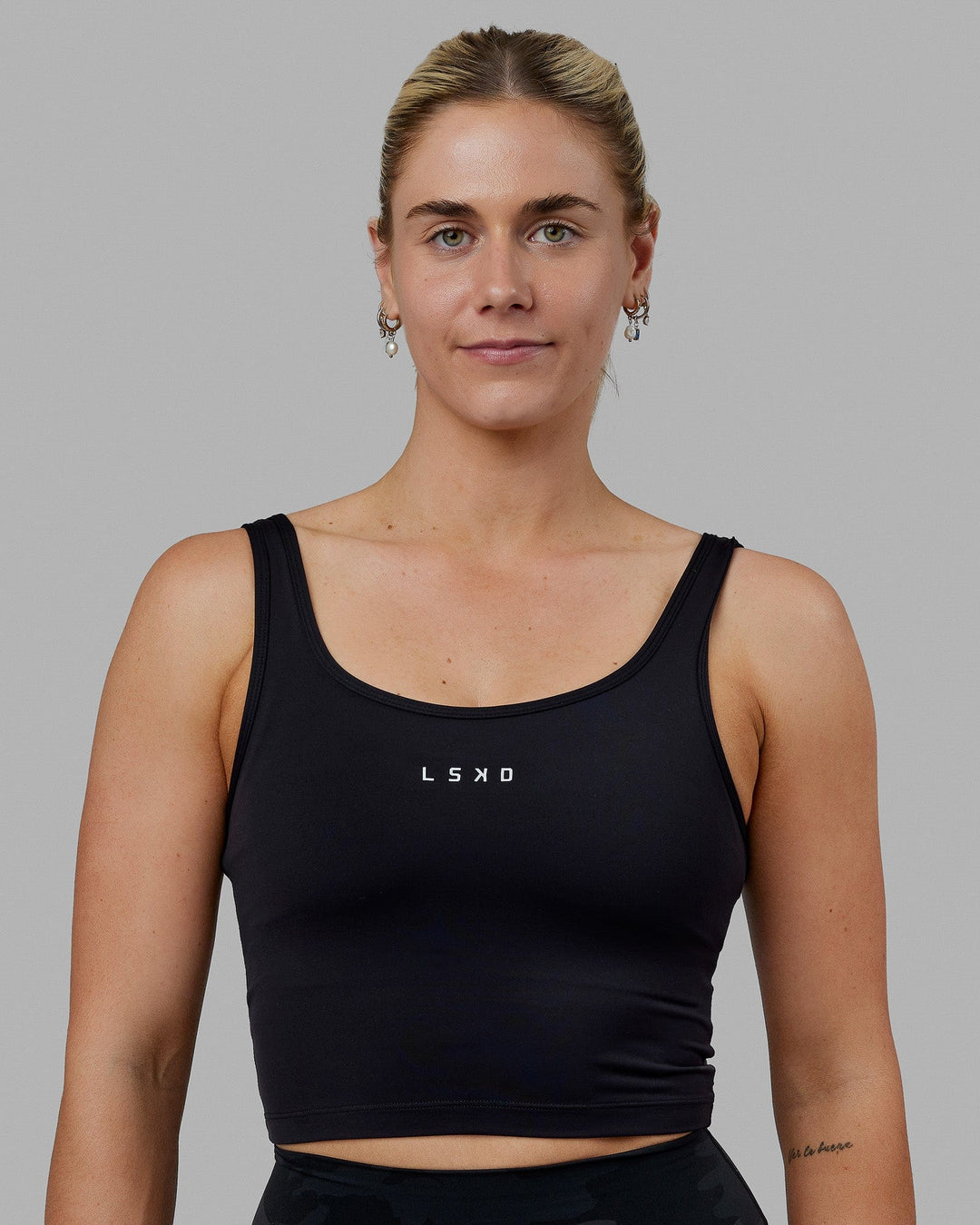 Woman wearing Staple Active Cropped Tank - Black