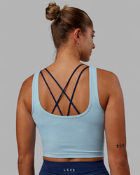Woman wearing Staple Active Cropped Tank - Glacial Blue