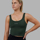 Woman wearing Staple Active Cropped Tank - Vital Green