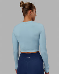 Woman wearing Staple LS Cropped Tee - Glacial Blue
