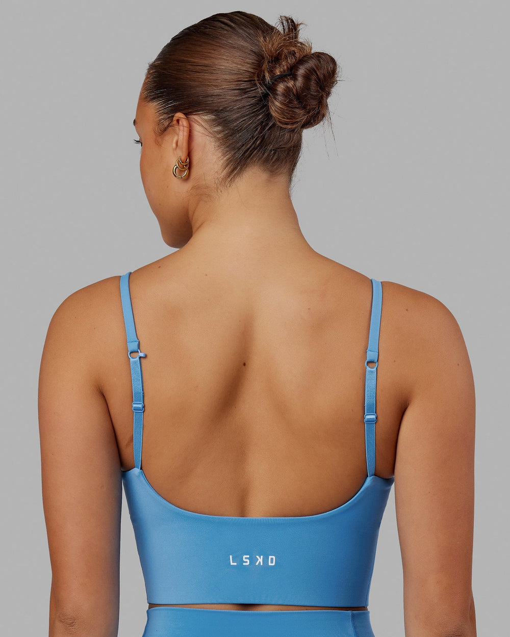 Woman wearing Streamline Bra - Azure Blue
