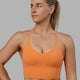 Woman wearing Streamline Bra - Tangerine