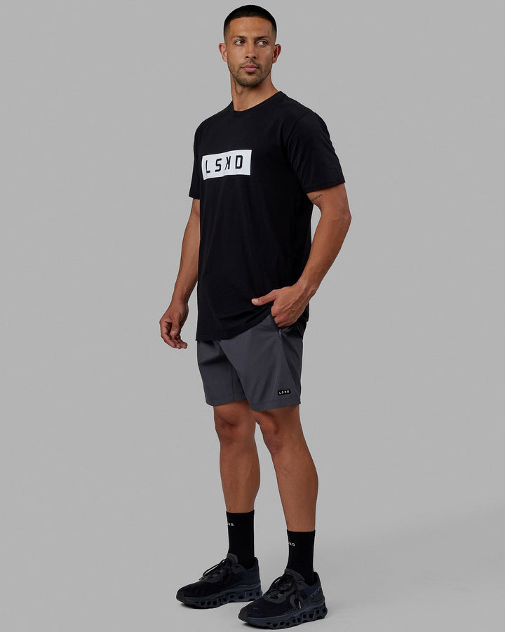 Man wearing Strength FLXCotton Tee - Black-White