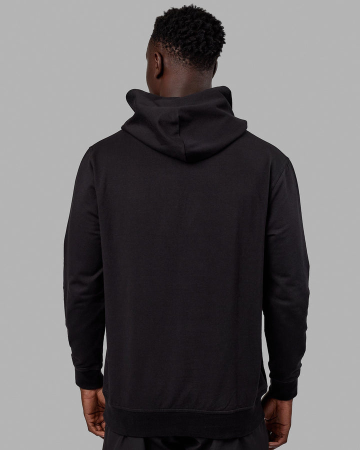 Man wearing Unisex Strength FLXFLeece Hoodie - Black-Black