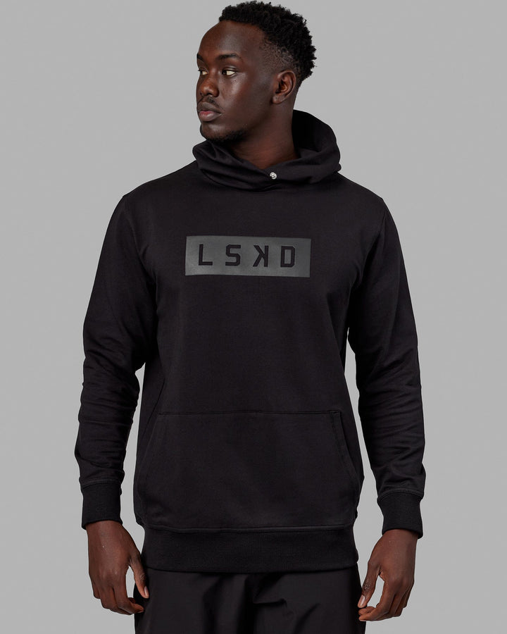 Man wearing Unisex Strength FLXFLeece Hoodie - Black-Black