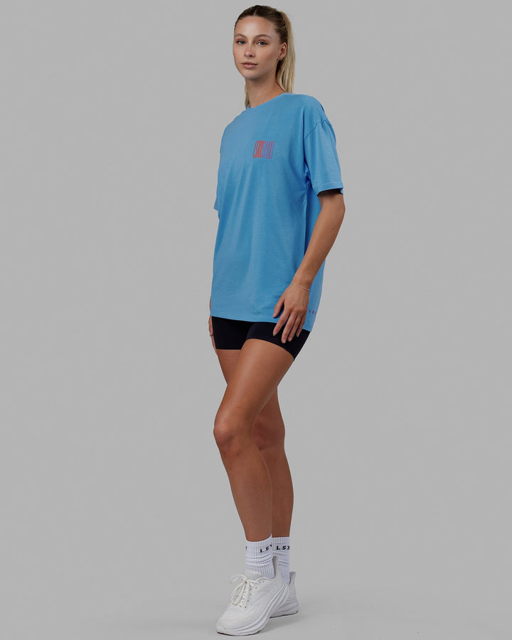 Woman wearing Unisex Stretch It FLXCotton Tee Oversize - Azure Blue