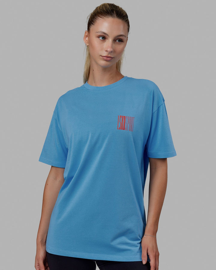 Woman wearing Unisex Stretch It FLXCotton Tee Oversize - Azure Blue