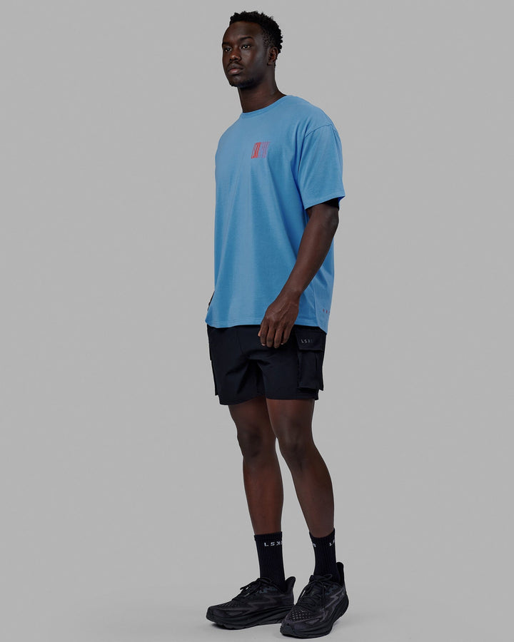 Man wearing Unisex Stretch It FLXCotton Tee Oversize - Azure Blue