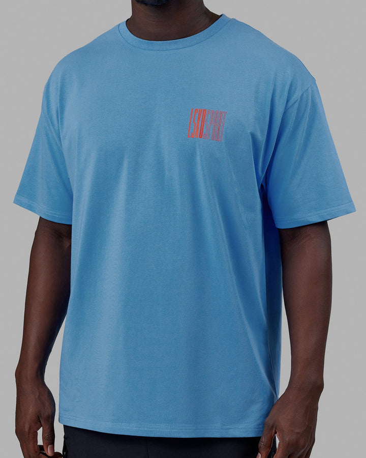 Man wearing Unisex Stretch It FLXCotton Tee Oversize - Azure Blue
