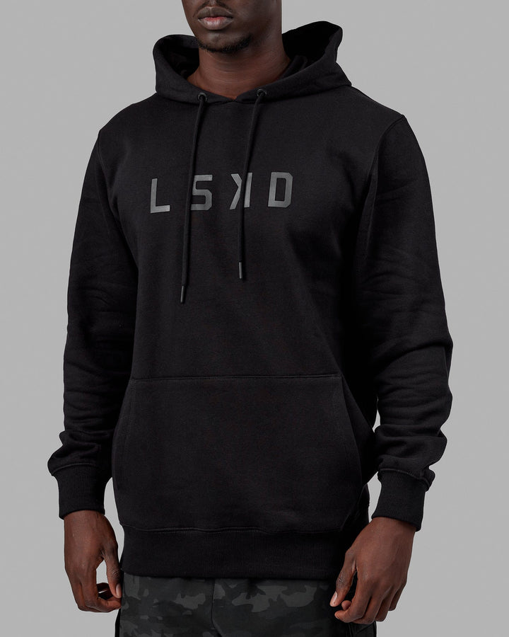 Man wearing Unisex Structure Hoodie - Black-Black