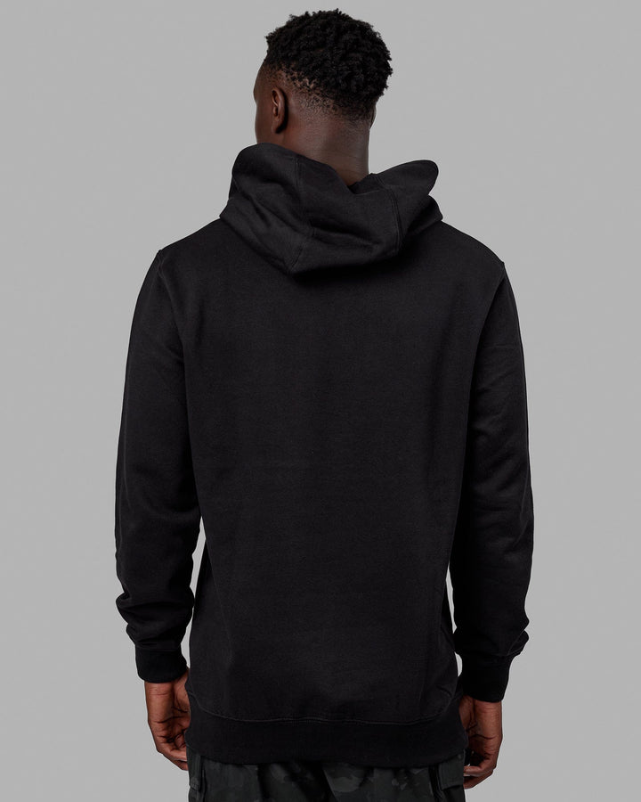 Man wearing Unisex Structure Hoodie - Black-Black