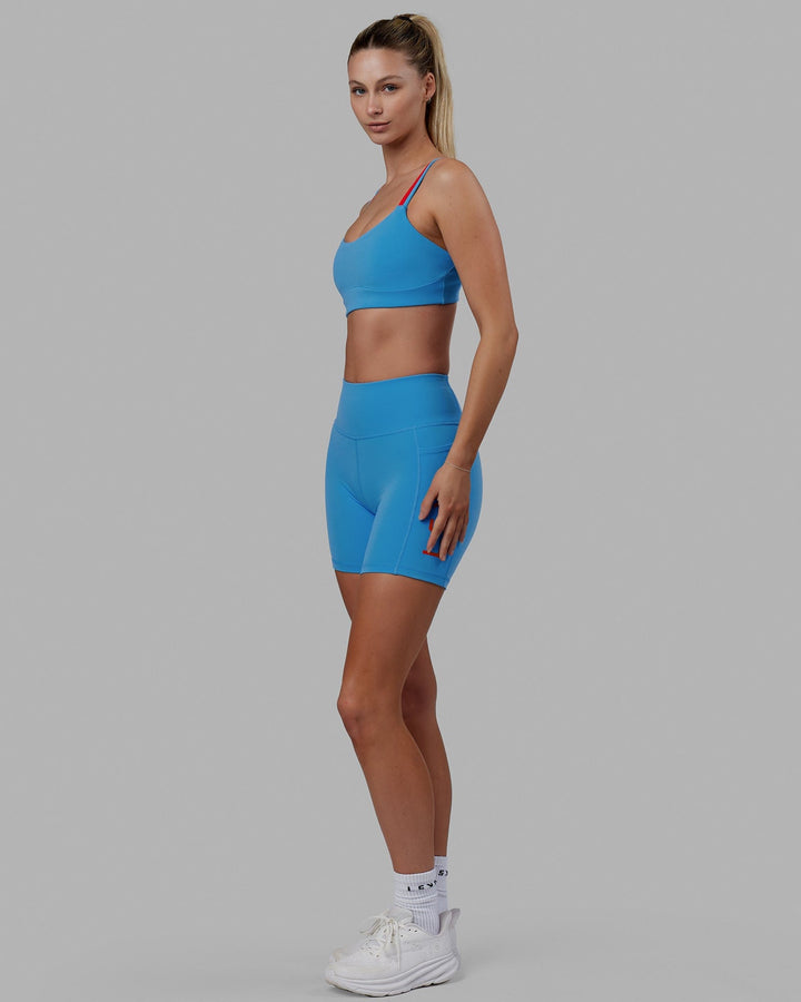 Woman wearing Structure Sports Bra - Azure Blue-Infrared