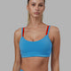 Woman wearing Structure Sports Bra - Azure Blue-Infrared