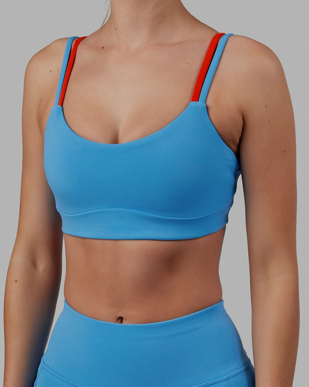 Woman wearing Structure Sports Bra - Azure Blue-Infrared