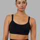 Woman wearing Structure Sports Bra - Black