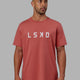 Man wearing Structure Tee - Mineral Red-White