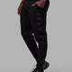 Man wearing Unisex Structure Track Pant - Black-Black