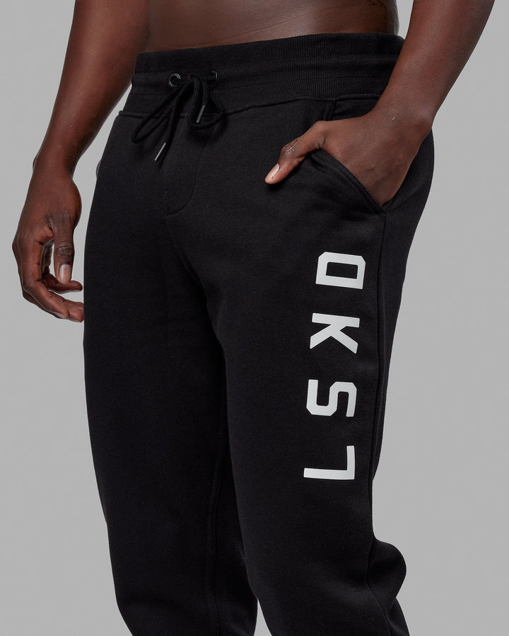 Man wearing Unisex Structure Track Pant - Black-White