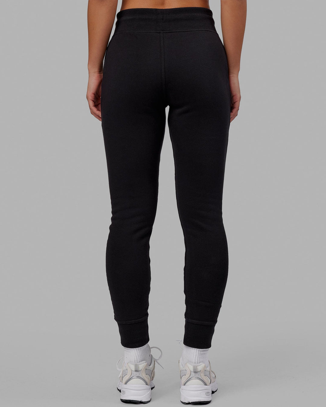 Woman wearing Unisex Structure Track Pant - Black-White
