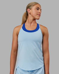 Woman wearing Swift Active Tank - Glacial Blue