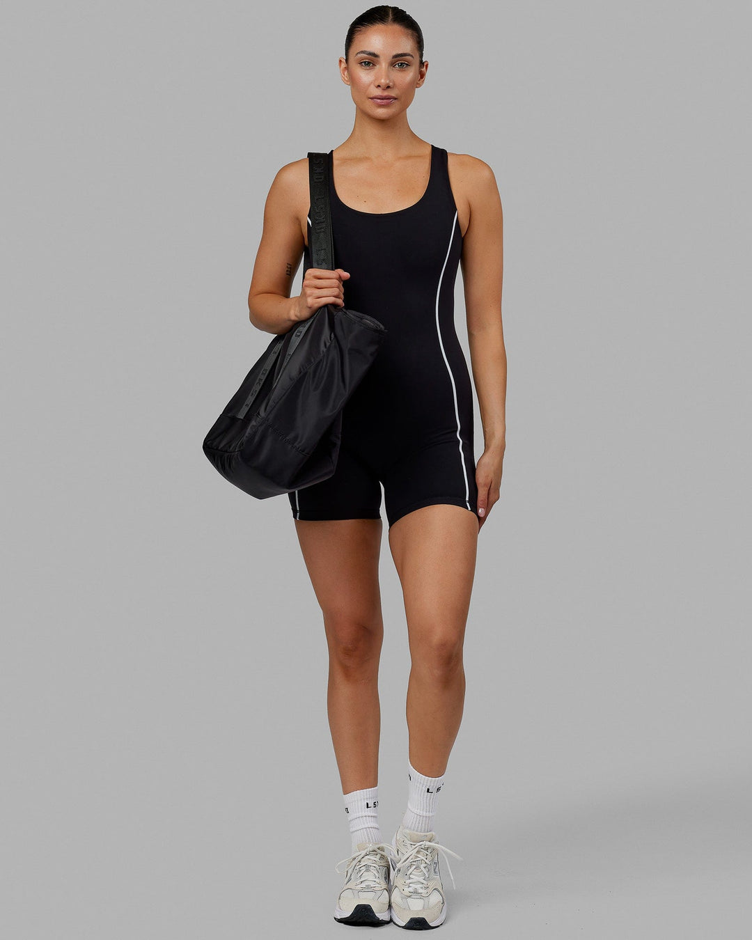 https://www.lskd.co/cdn/shop/files/Model-Technique-Bodysuit-Black-White-1.jpg?v=1702857763&width=1080