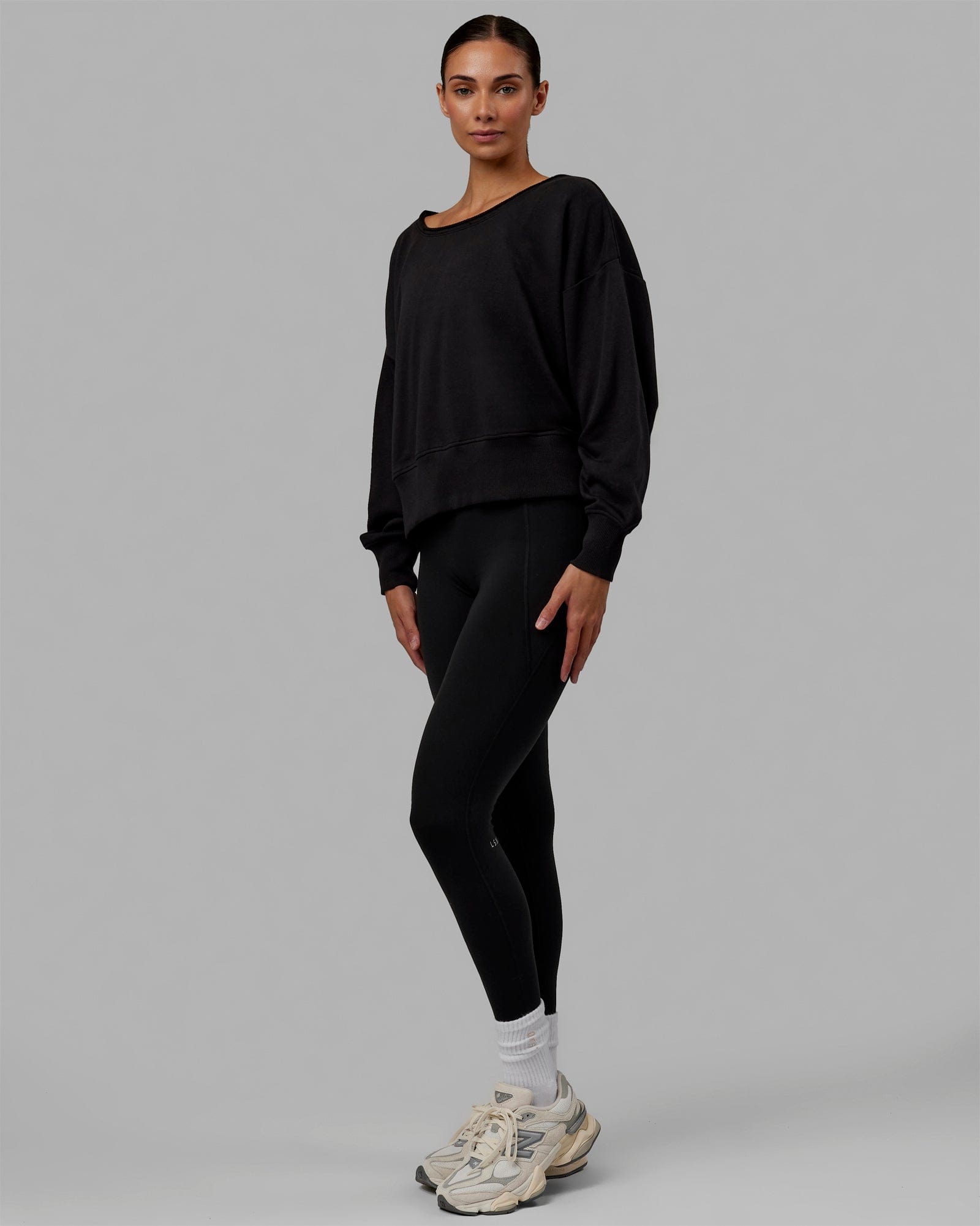 Woman wearing Tempo Sweater - Black
