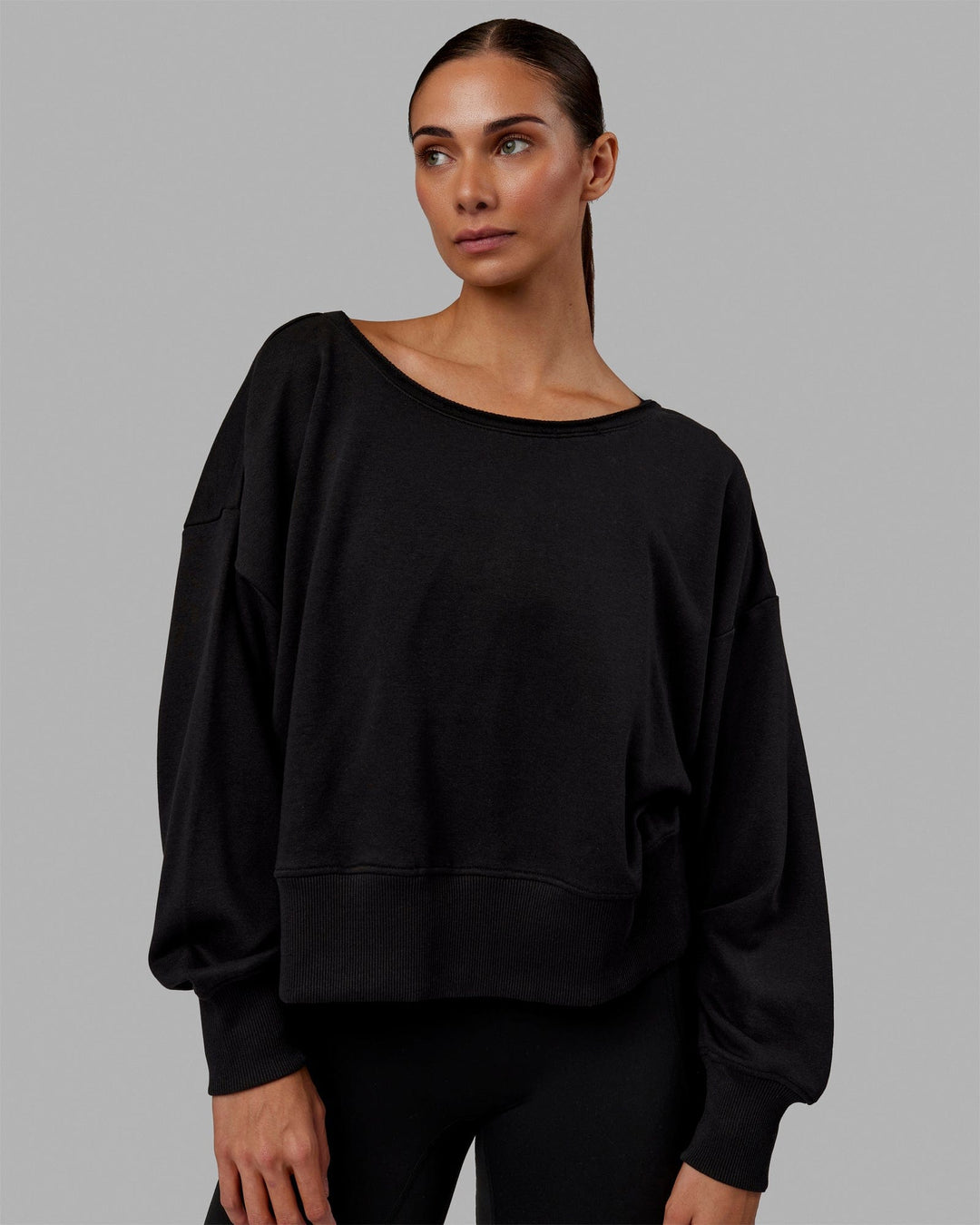 Woman wearing Tempo Sweater - Black