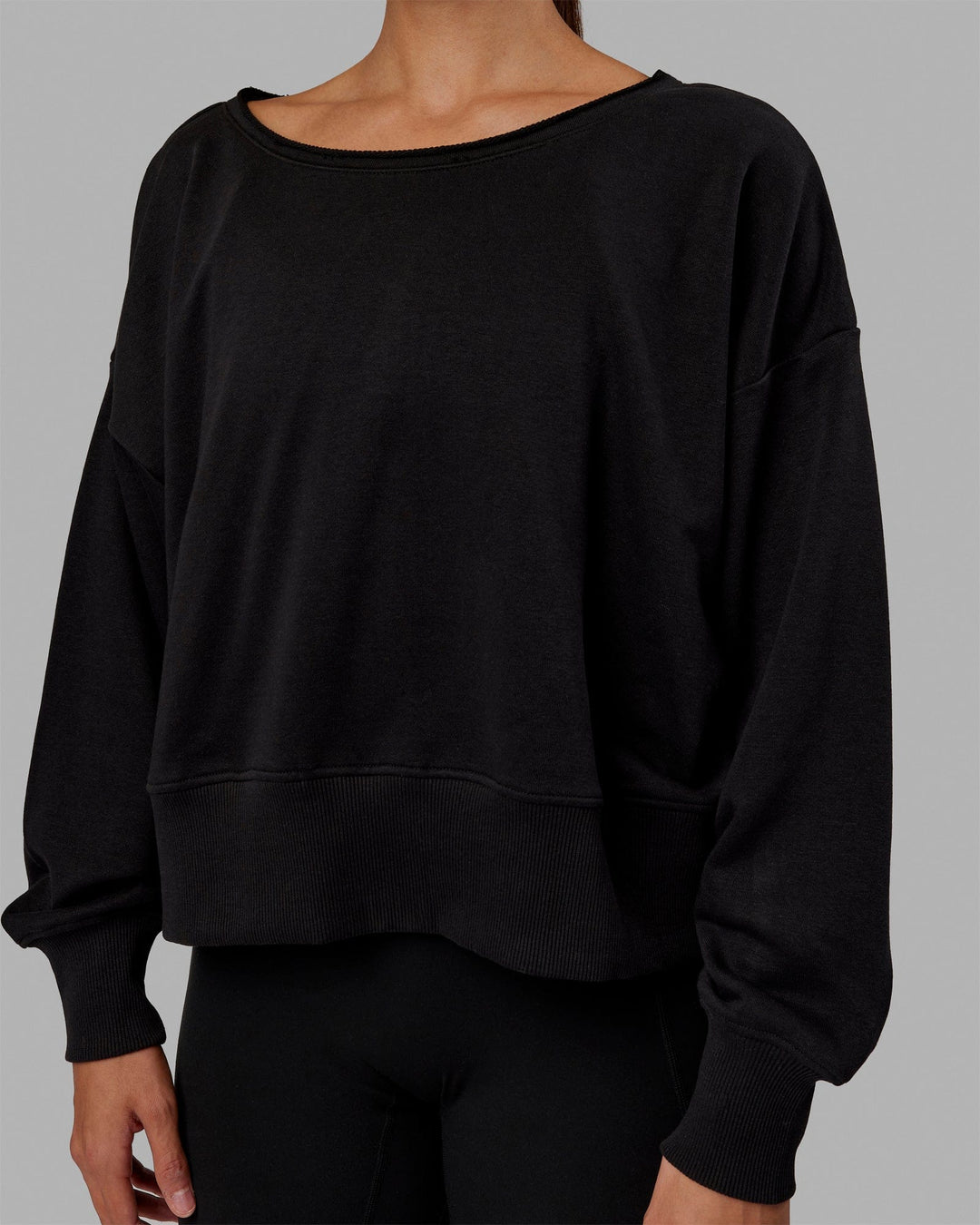 Woman wearing Tempo Sweater - Black