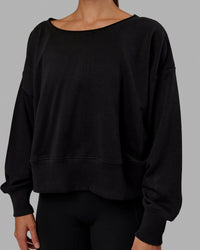 Woman wearing Tempo Sweater - Black