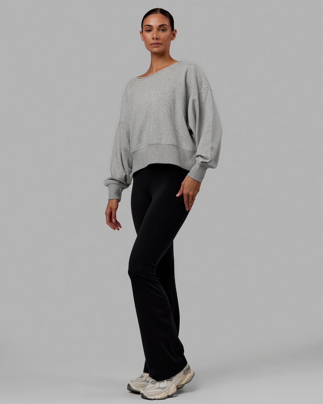 Woman wearing Tempo Sweater - Light Grey Marl