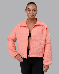 Woman wearing Thrive Packable Jacket - Murex Shell