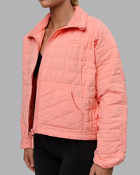 Woman wearing Thrive Packable Jacket - Murex Shell