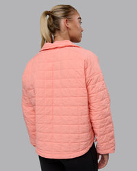 Woman wearing Thrive Packable Jacket - Murex Shell