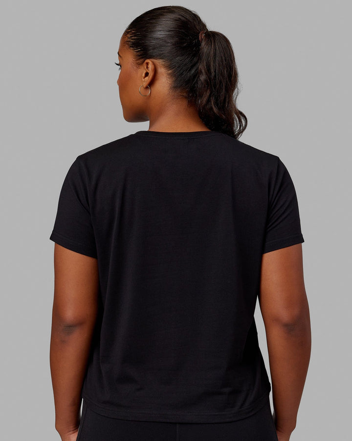 Woman wearing Together Tee - Pride-Black