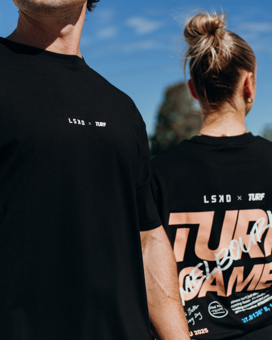 Duo wearing Turf Games Melbourne FLXCotton Oversize Tee - Black | Model:Both | Size:Duo