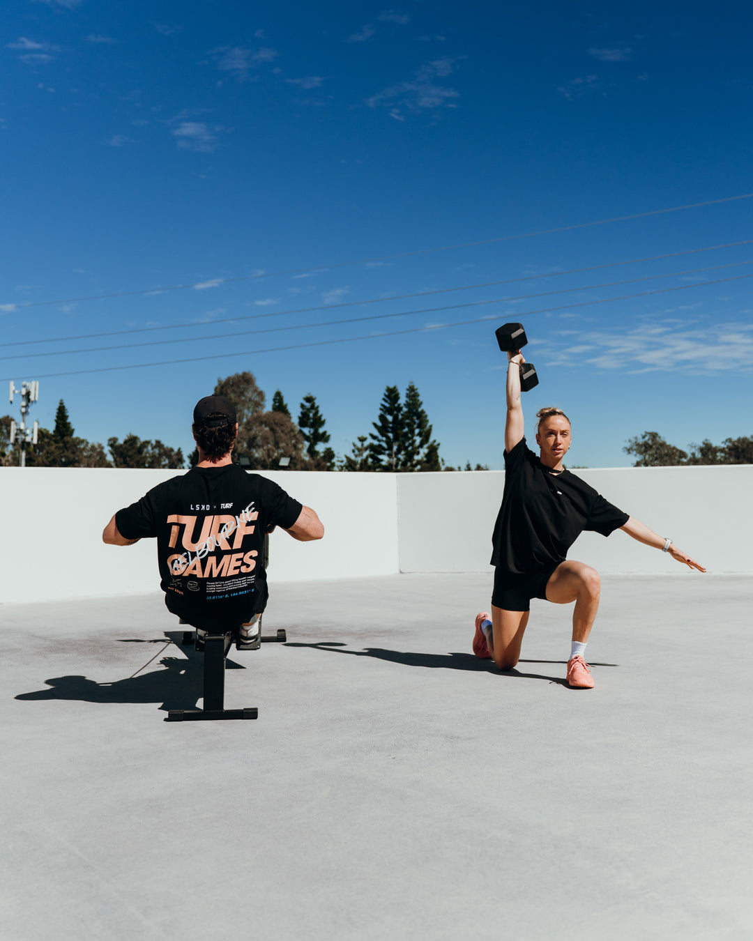 Duo wearing Turf Games Melbourne FLXCotton Oversize Tee - Black | Model:Both | Size:Duo