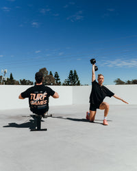 Duo wearing Turf Games Melbourne FLXCotton Oversize Tee - Black | Model:Both | Size:Duo