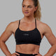 Woman wearing Lift Sports Bra - Black