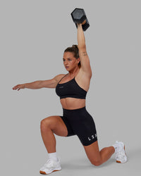 Woman wearing Lift Sports Bra - Black