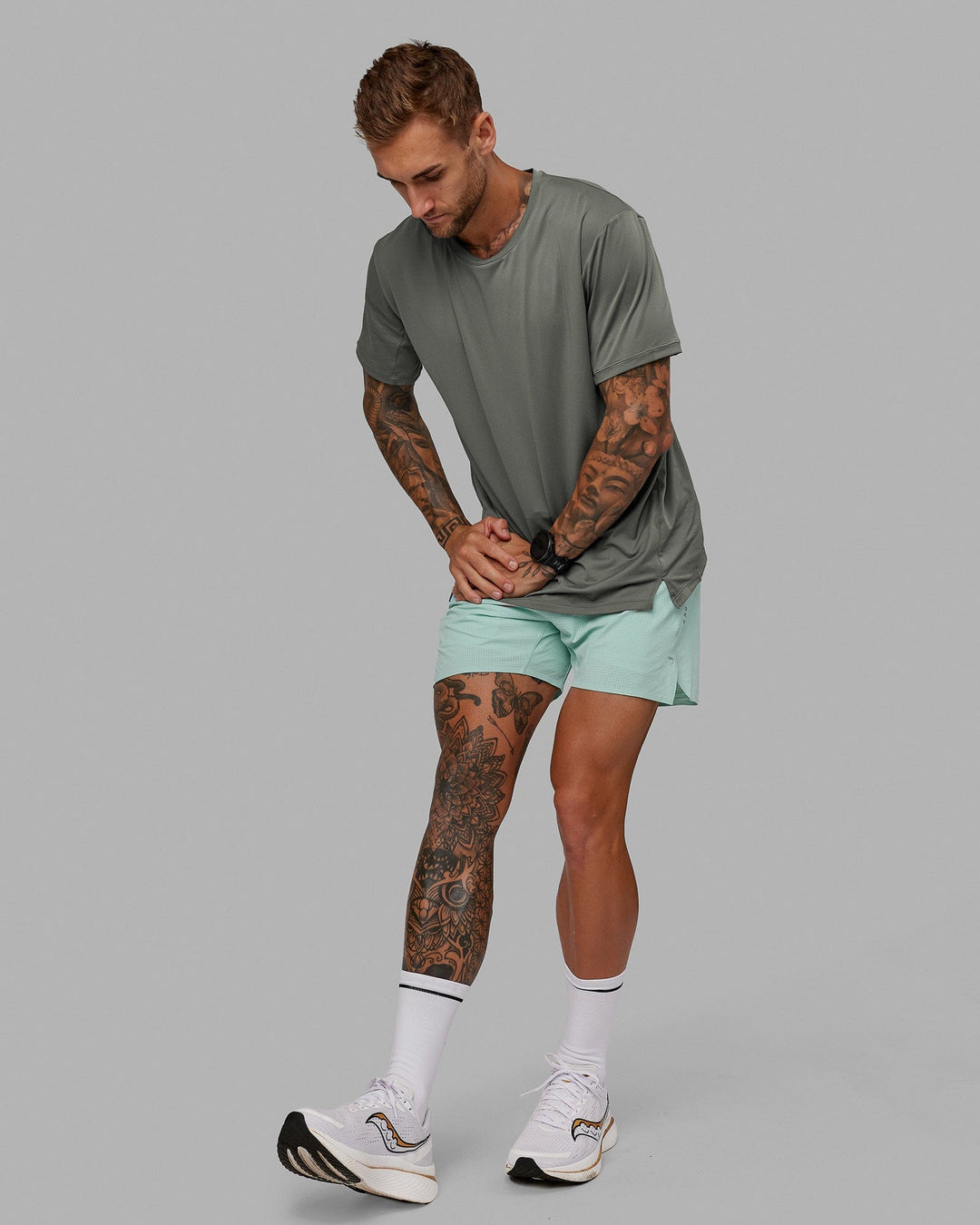 Man wearing UltraAir 5" Lined Performance Short - Pastel Turquoise-Reflective