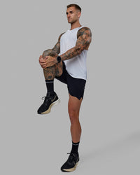 Man wearing UltraAir 5" Lined Performance Short - Black-Reflective