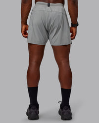 Man wearing UltraAir 5" Lined Performance Shorts - Circular Grey