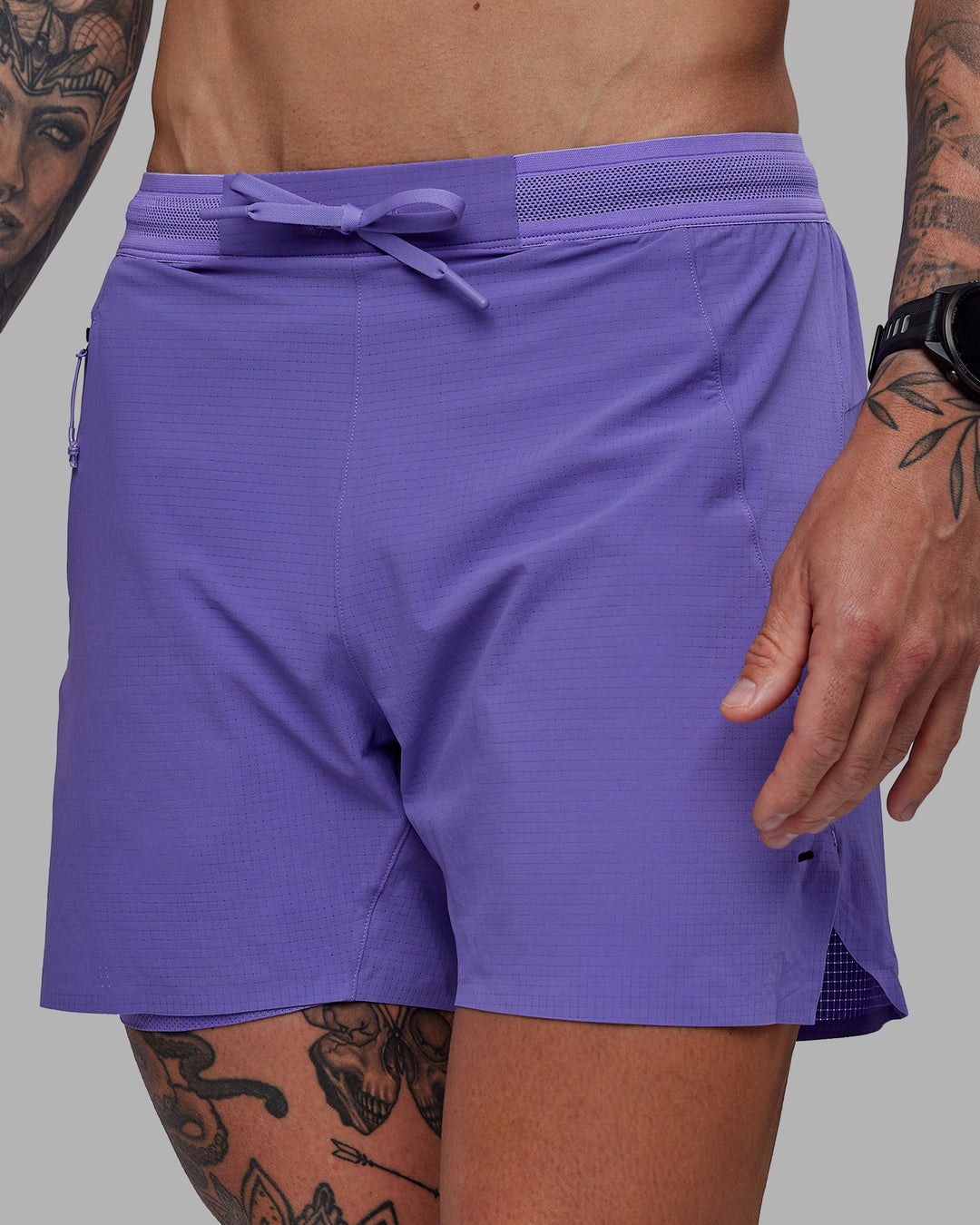 Man wearing UltraAir 5" Lined Performance Shorts - Dahlia Purple