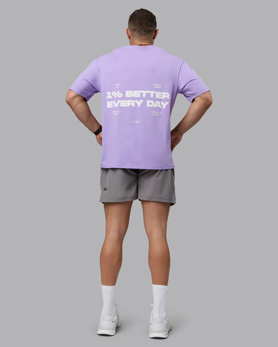 Man wearing Unisex 1% Better Value Series FLXCotton Tee Oversize - Pale Lilac-White