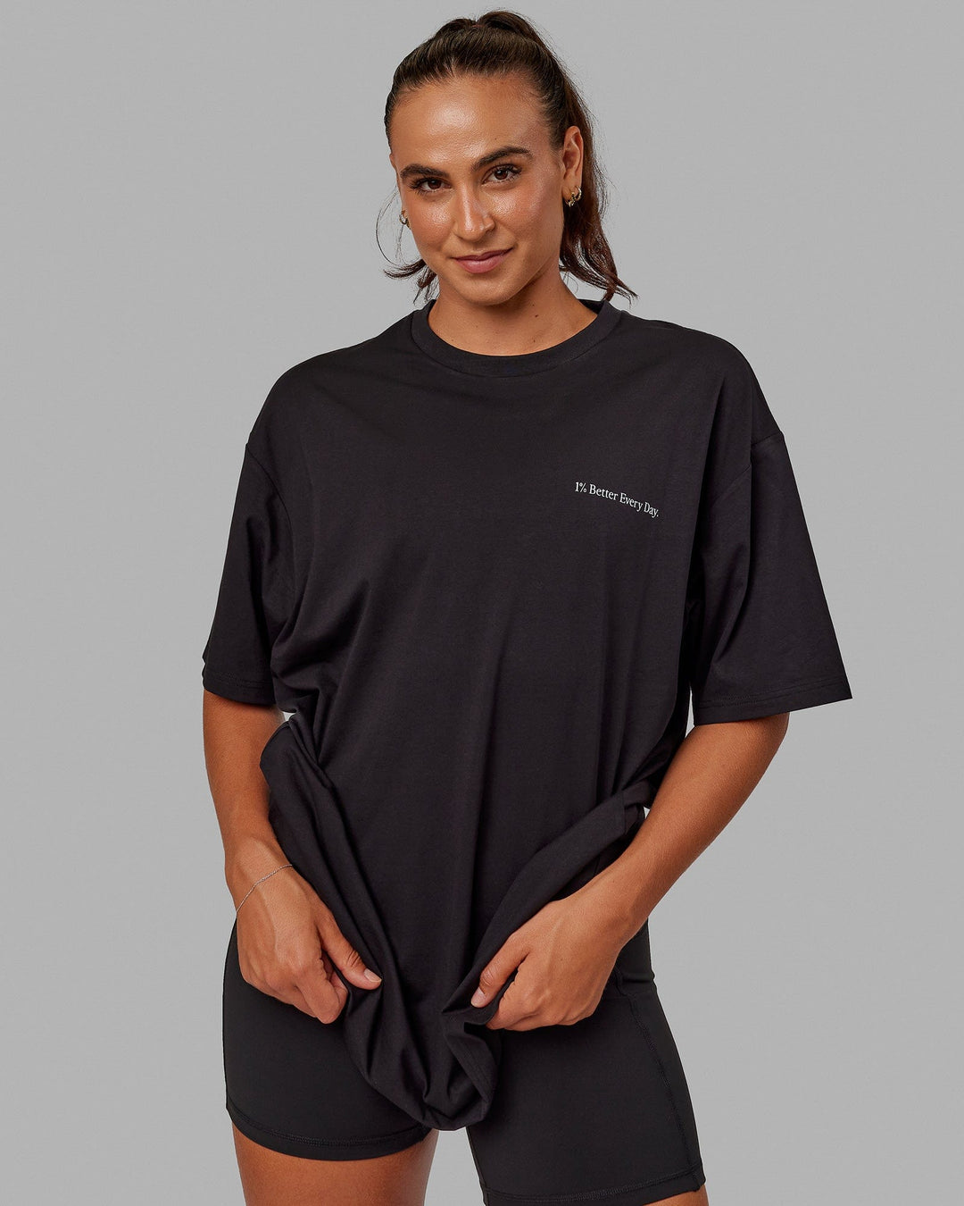 Woman wearing Unisex Better Every Day FLXCotton Tee Oversize - Black-Ultimate Grey