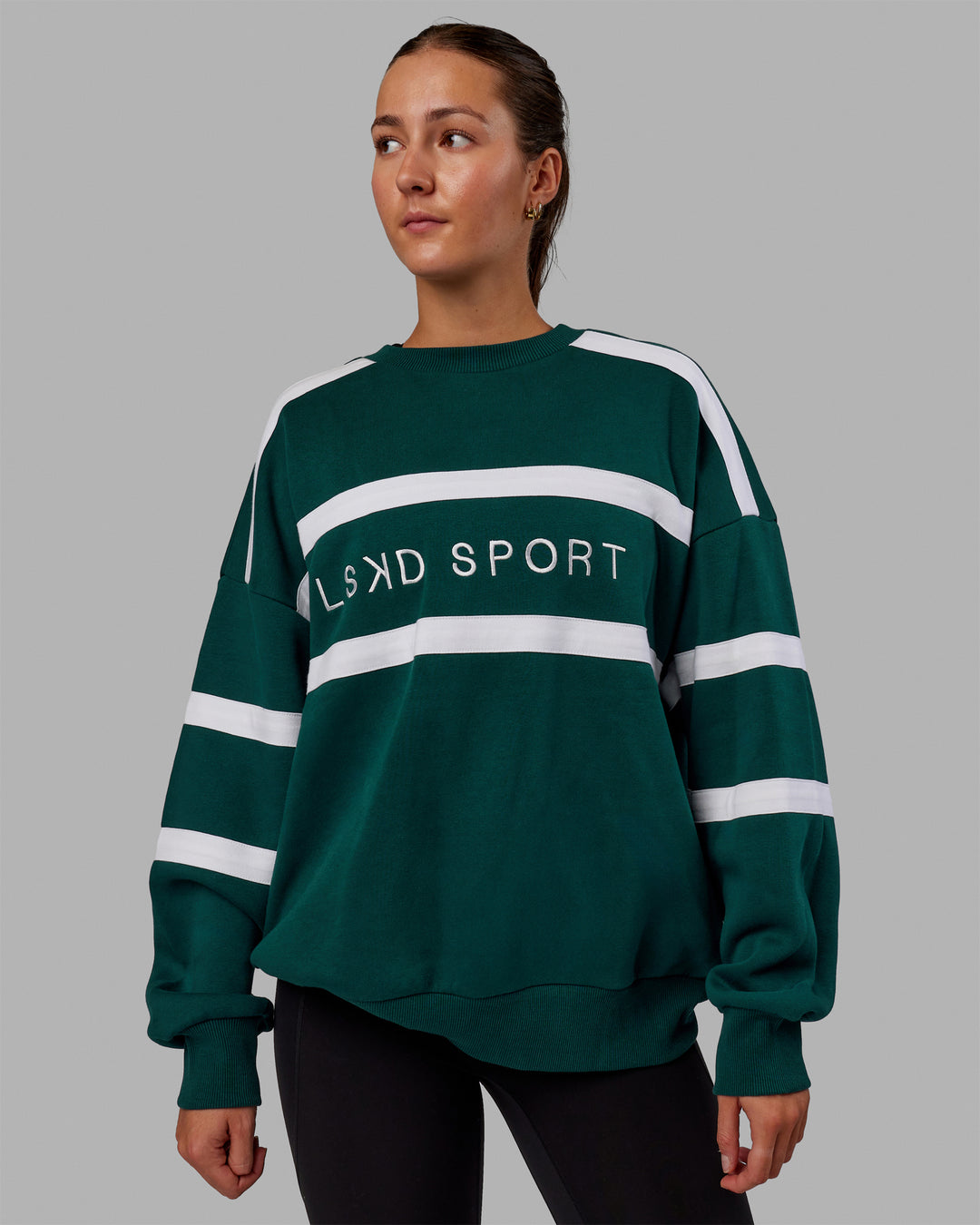 Woman wearing Unisex Collateral Sweater Oversize - Dark Moss-White