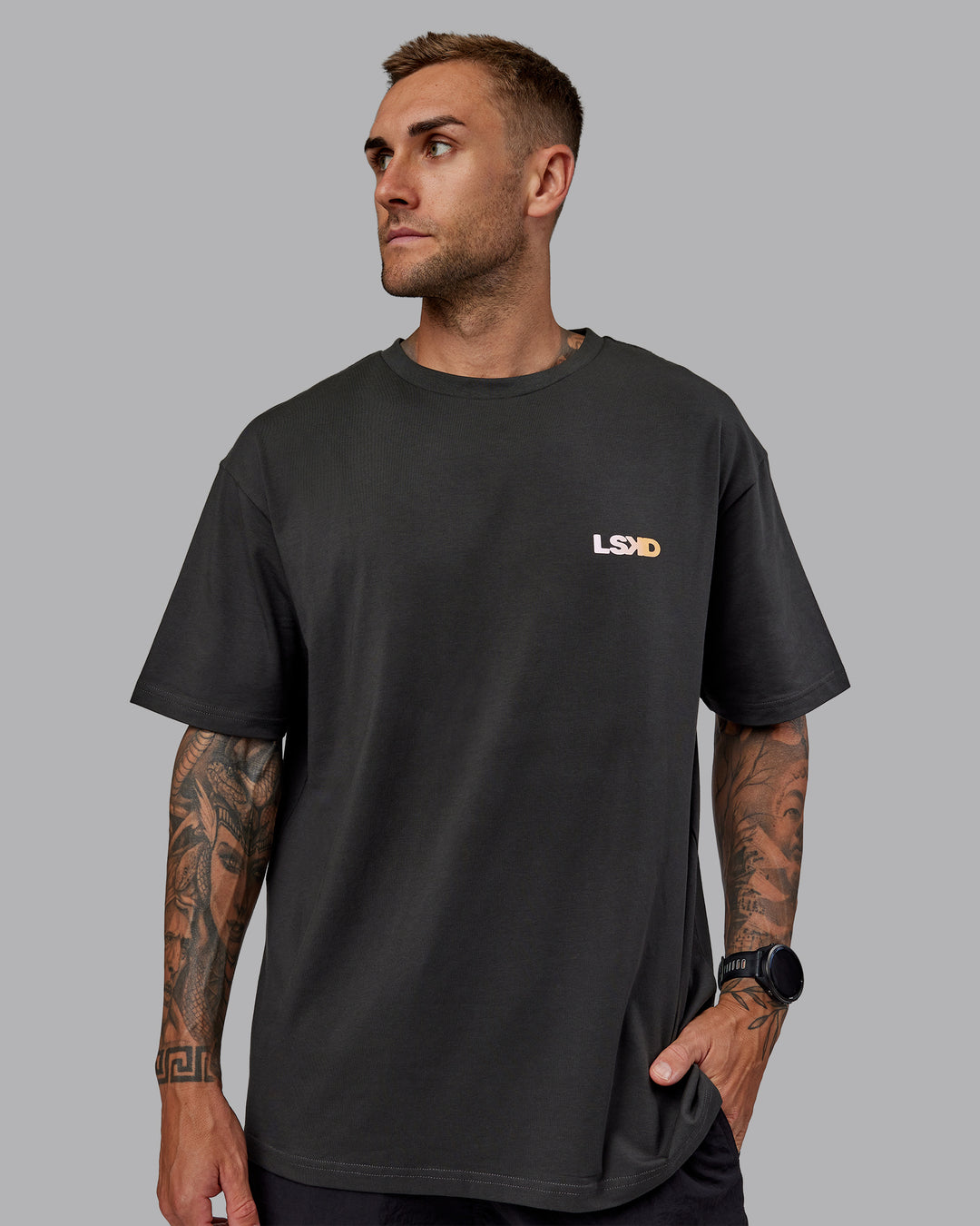 Man wearing Unisex E.T.J FLXCotton Tee Oversize - Pirate Black-Pop Pink