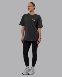 Woman wearing Unisex E.T.J FLXCotton Tee Oversize - Pirate Black-Pop Pink