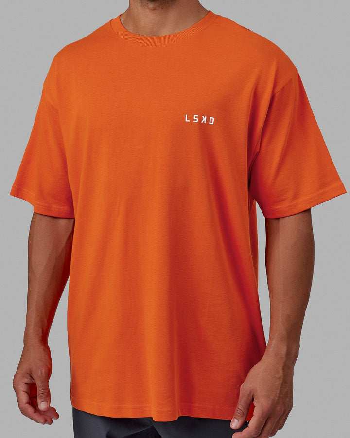 Man wearing Unisex Endeavour Heavyweight Tee Oversize - Impact Orange