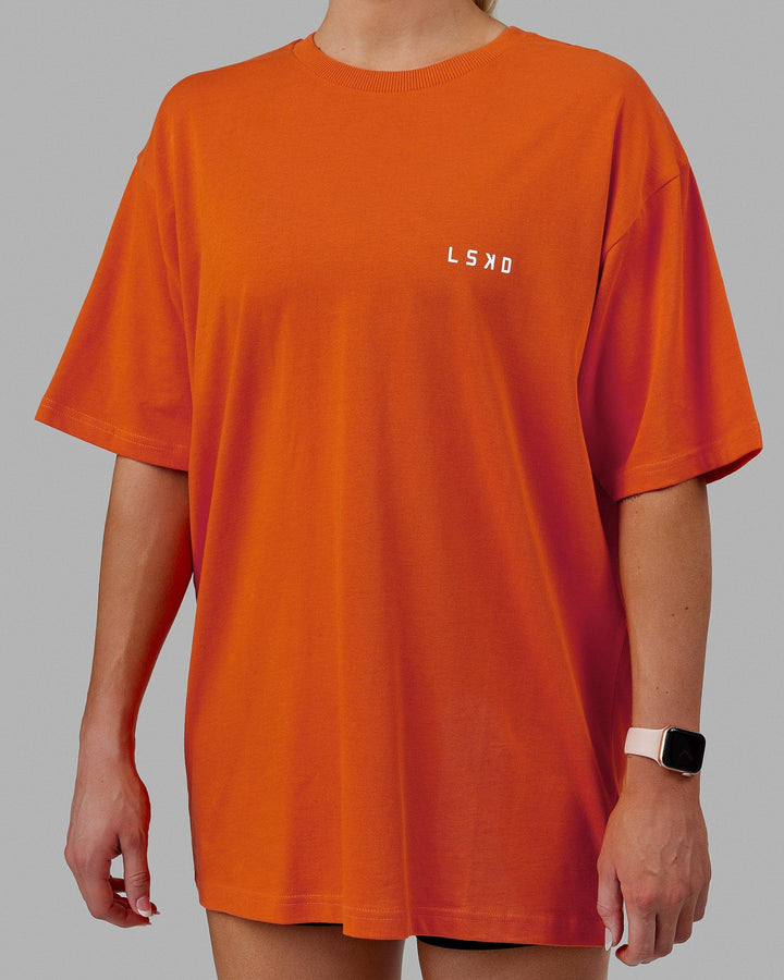 Woman wearing Unisex Endeavour Heavyweight Tee Oversize - Impact Orange